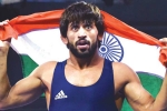 Bajrang Punia in new york, Bajrang Punia, indian wrestler bajrang punia appeals indians to support him at madison square garden, Khel ratna