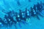 Top Stories, NRI and team break Guinness world record for the longest human chain underwater, nri and team creates guinness world record, Human chain